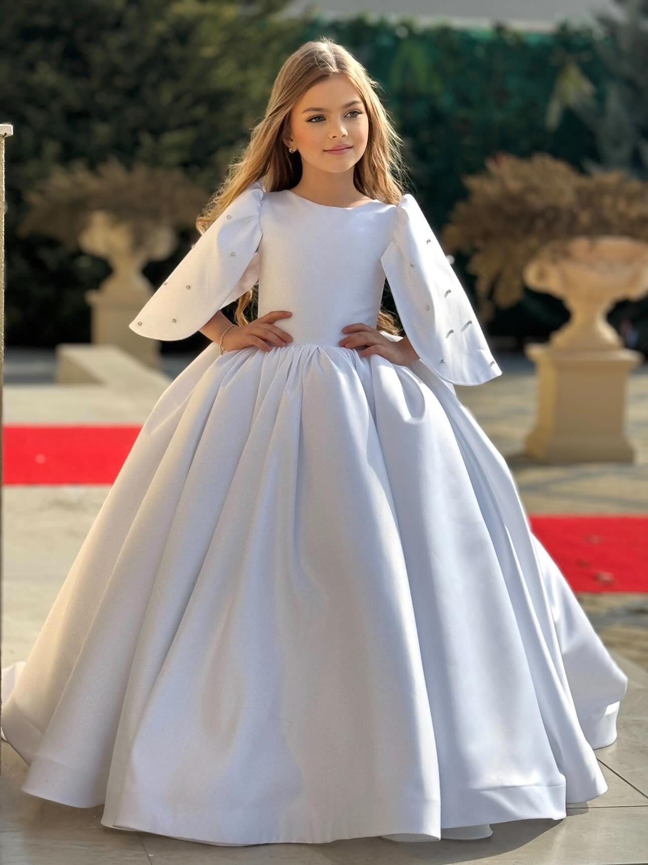 "Majestic Ball Gown with headband , flowing train and crystal embellishments"